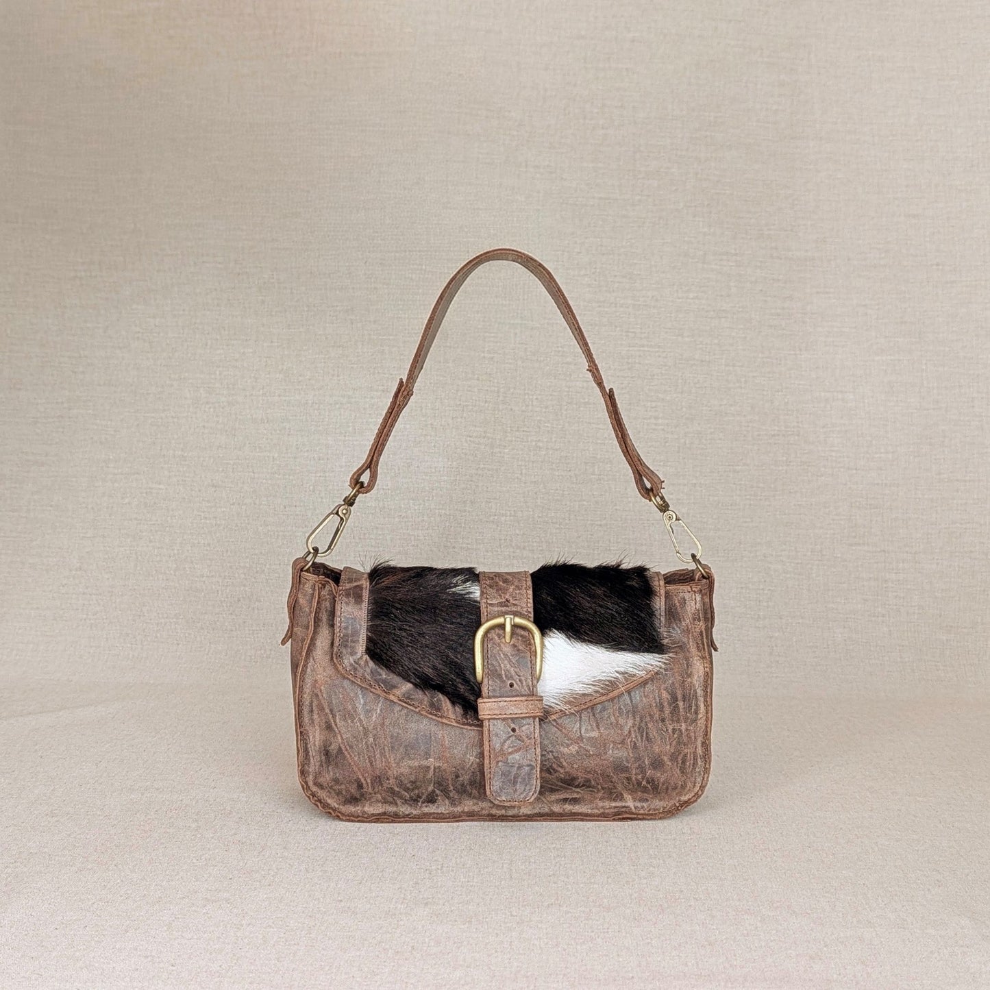 bolso-pequeño-piel-de-ternera-engrasada-solapa-hairon